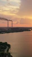 Atmospheric view of river. Aerial view of river at sunset Vertical video