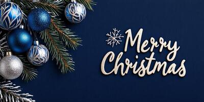 Stylish Christmas card featuring silver and blue ornaments on a deep navy background with elegant typography photo