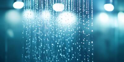 Elegant dual showerhead system with rainfall and handheld options in a sleek, glass-walled shower area photo
