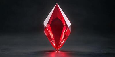 Glowing red crystal on a dark artistic background creating a mysterious and moody atmosphere photo