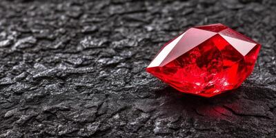 A dark and mysterious setting illuminated by a vibrant red glowing crystal amid deep shadows and a crimson palette photo