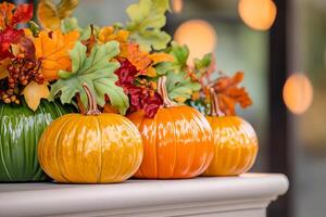 Colorful gourds and decorative leaves create a vibrant autumn display for seasonal celebrations photo