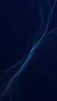 Minimalist background with an elegant flowing blue fractal light wave rippling gently. Smooth digital data stream concept. Vertical abstract technology background animation. video