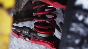 The spring is in the car. Clip. A snowy landscape with a spare part in a car that is being filmed in close-up. video
