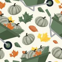 autumn seamless pattern with round green pumpkins stacked in a wheelbarrow and various autumn leaves on a light background vector