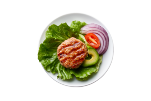 Healthy lettuce wrap burger with avocado and onion on a plate isolated on a transparent background png