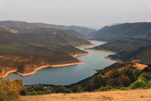 Mountains and Meanders of Zavoj Lake from Viewpoint photo