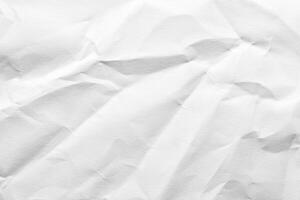 Crumpled white paper texture for background design and creative projects. photo