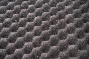 Textured foam surface pattern for soundproofing and acoustic design concepts. photo