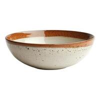 A bowl with a speckled surface on a white background photo