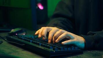 Programmer man keyboard computer typing hacker internet networking online professional software cyber tech security pc web coding browsing gaming player developer server monitor connect electronic guy photo