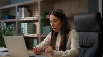 Caucasian business woman working on laptop feel stressed about system virus shocked girl businesswoman computer failure trouble important data loss outraged with website mistake malware loosing error photo
