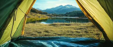 Tourist tent at campsite, beautiful landscape with copy space, view from inside photo