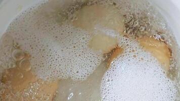 eggs are boiling in white casserole video
