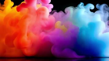 Abstract cloud shaped object of vibrant orange, pink, and blue on a black background with reflection. video