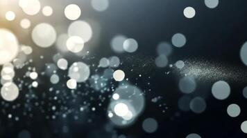 Abstract bokeh lights on a dark background with a subtle sparkly overlay. video