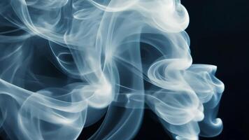 Abstract smoke swirls with delicate texture, creating a whimsical and ethereal design against a dark background. video