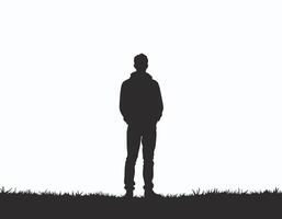 Silhouette of a man standing alone in a grassy field, conveying solitude and contemplation against a stark white background. vector