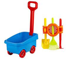 A set of children's toys for playing in the sand with a children's shovel, a car and a rake. the concept of children's recreation in the sandbox or on the beach. isolated on white background photo