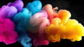 Abstract colorful ink clouds swirling and mixing in water against a black background. video