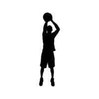 Silhouette of a basketball player making a shot into the hoop vector
