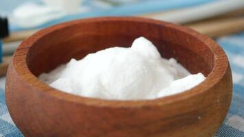 Baking soda and whole lemon on table video