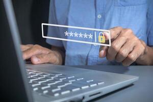 Man accessing a laptop computer with pin code. Encrypted data. Business Technology security Concept. photo