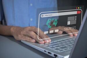 Man works on a laptop to search for information using internet search page on a virtual screen. Search engine optimization concept. photo