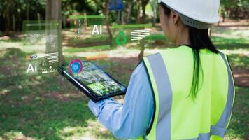 ESG concepts for environment, Society and governance. Female Engineer uses ipad to analyze ESG in business investment strategy concept. Which the screen shows with a green graph photo