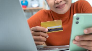 Online banking transaction concept, Woman with credit card using smart phone and shopping online, Ecommerce and secure mobile banking concept, Making online payments. photo