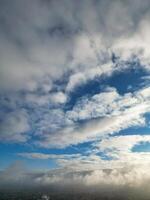 Aerial View of Manchester City During Autumn Season and Cloudy Day over England Great Britain. High Angle Drone's Camera Footage was Captured on October 29th, 2024 photo