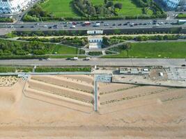 High Angle View of Most Beautiful and Attractive British Tourist Attraction of Brighton seaside resort and Beach City of East Sussex, England GB. Footage Captured with Drone's Camera on May 9th, 2024 photo