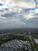 Aerial View of Manchester City During Autumn Season and Cloudy Day over England Great Britain. High Angle Drone's Camera Footage was Captured on October 29th, 2024 photo
