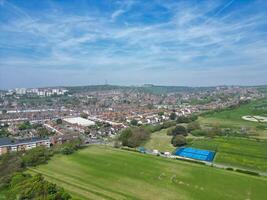 High Angle View of Most Beautiful and Attractive British Tourist Attraction of Brighton seaside resort and Beach City of East Sussex, England GB. Footage Captured with Drone's Camera on May 9th, 2024 photo