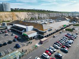 High Angle View of Most Beautiful and Attractive British Tourist Attraction of Brighton seaside resort and Beach City of East Sussex, England GB. Footage Captured with Drone's Camera on May 9th, 2024 photo