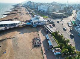 High Angle View of Historical Central Eastbourne Buildings and City of England, United Kingdom. Aerial Footage Was Captured with Drone's Camera During Windy Day on May 11th, 2024 photo