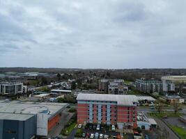 high Angle View of Buildings at Central Borehamwood London City of England United Kingdom. April 4th, 2024, Aerial View Was Captured with Drone's Camera From High altitude During Cloudy and Windy Day. photo