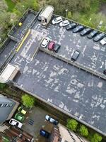 high Angle View of Buildings at Central Borehamwood London City of England United Kingdom. April 4th, 2024, Aerial View Was Captured with Drone's Camera From High altitude During Cloudy and Windy Day. photo