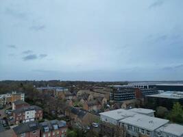 high Angle View of Buildings at Central Borehamwood London City of England United Kingdom. April 4th, 2024, Aerial View Was Captured with Drone's Camera From High altitude During Cloudy and Windy Day. photo