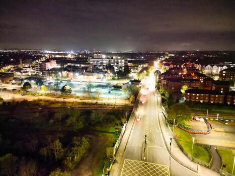 Aerial View of Illuminated Central Bedford City of England United Kingdom During Night. April 5th, 2024, High Angle Footage Was Captured after Sunset and Beginning of Night with Drone's Camera photo