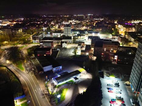 Aerial View of Illuminated Central Bedford City of England United Kingdom During Night. April 5th, 2024, High Angle Footage Was Captured after Sunset and Beginning of Night with Drone's Camera photo