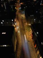 Aerial View of Illuminated Southampton Docks and Port City Centre During Dark Night. England United Kingdom. High Angle Drone's Camera Footage Captured from High Altitude on May 16th, 2024 photo