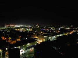 Aerial View of Illuminated Southampton Docks and Port City Centre During Dark Night. England United Kingdom. High Angle Drone's Camera Footage Captured from High Altitude on May 16th, 2024 photo