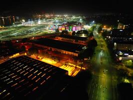 Aerial View of Illuminated Southampton Docks and Port City Centre During Dark Night. England United Kingdom. High Angle Drone's Camera Footage Captured from High Altitude on May 16th, 2024 photo