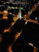 Aerial View of Illuminated Southampton Docks and Port City Centre During Dark Night. England United Kingdom. High Angle Drone's Camera Footage Captured from High Altitude on May 16th, 2024 photo