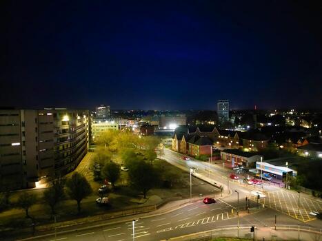Aerial View of Illuminated Central Bedford City of England United Kingdom During Night. April 5th, 2024, High Angle Footage Was Captured after Sunset and Beginning of Night with Drone's Camera photo