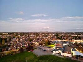 Most Beautiful High Angle View of Illuminated Luton City of England UK at Just After Sunset and Full Moon Night. Aerial Footage Was Captured with Drone's Camera on October 17th, 2024 photo