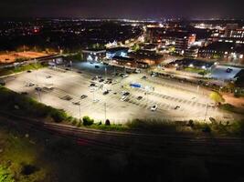 Aerial View of Illuminated Central Bedford City of England United Kingdom During Night. April 5th, 2024, High Angle Footage Was Captured after Sunset and Beginning of Night with Drone's Camera photo