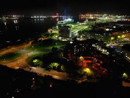 Aerial View of Illuminated Southampton Docks and Port City Centre During Dark Night. England United Kingdom. High Angle Drone's Camera Footage Captured from High Altitude on May 16th, 2024 photo