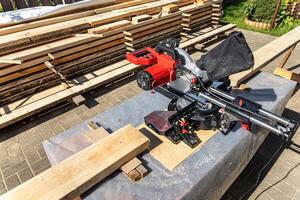 Close-up of a wooden frame for a new construction project. The frame rests on a concrete foundation. Construction of a wooden frame house. photo